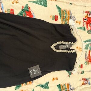 Lulus black dress.. brand new never worn doesn’t fit up region right…Size Medium